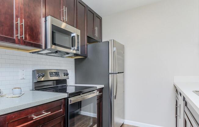 a stainless steel refrigerator in a kitchen