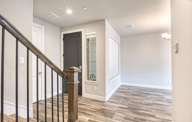 Luxury Sun-Drenched End-Unit Townhouse Offering Effortless Upscale Living in the Heart of Plano!