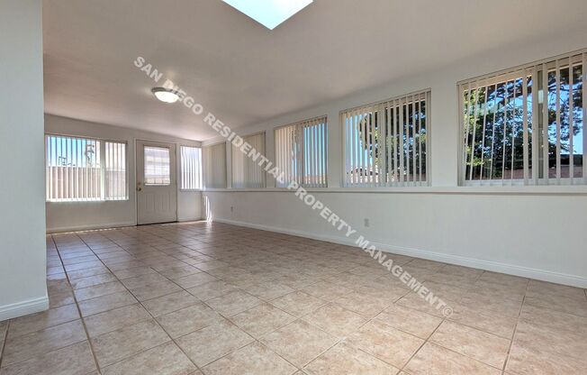 Spacious 3-Bedroom, 2-Bath Home Near the Beach – Sunroom, Workshop, Attached Garage & Large Backyard!