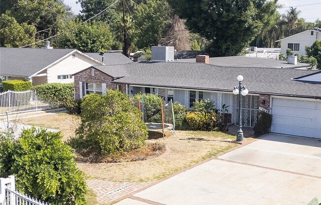 7856 PASO ROBLES AVE