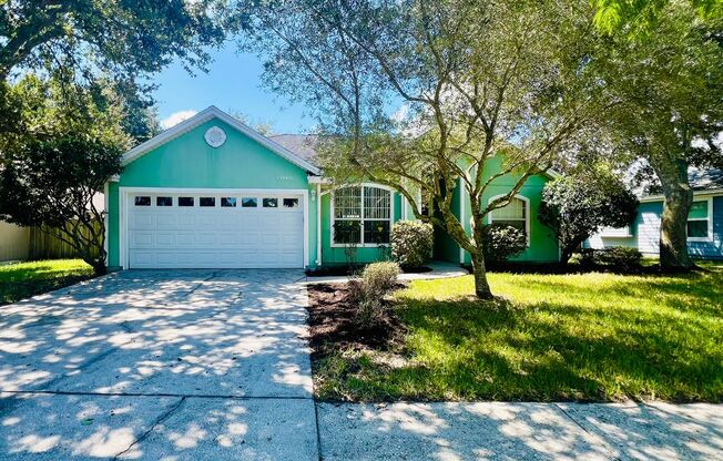 Lovely home with sunroom in Greenfield Lakes