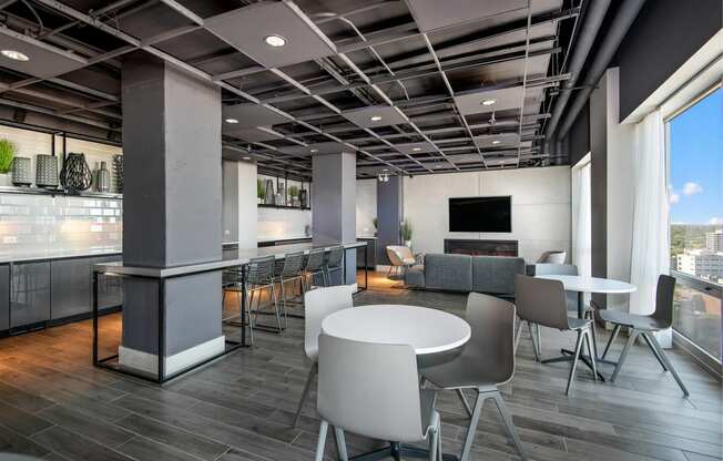 a rendering of a dining room with tables and chairs