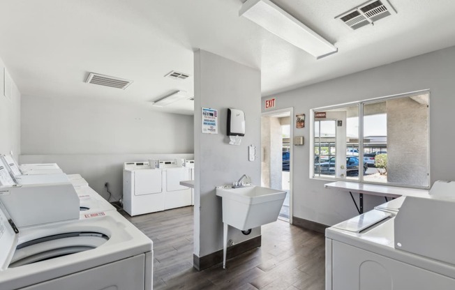 the preserve at ballantyne commons laundry room with washer and dryer