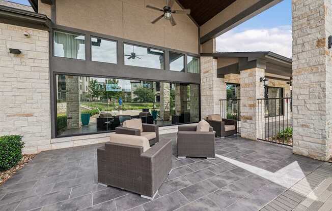 A patio with a table and chairs is shown.