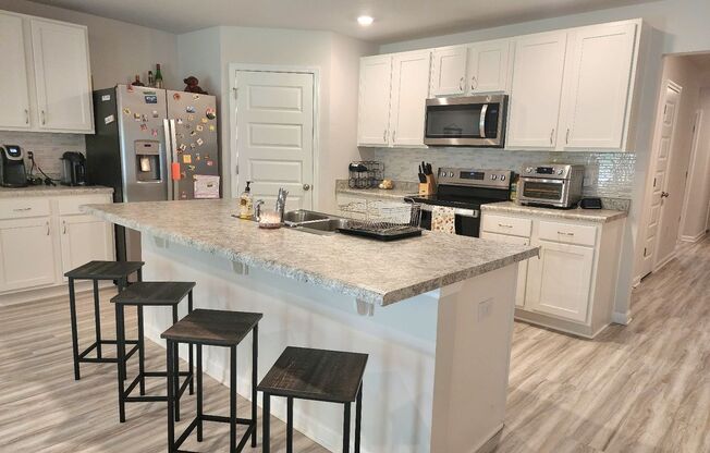 Almost Brand New 4 Bedroom, 2 Bath located in the heart of Pace!