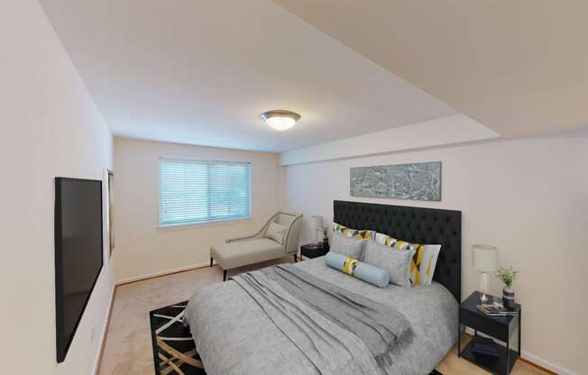 bedroom with bed, nightstands, large windows and tv at cambridge square apartments in bethesda md