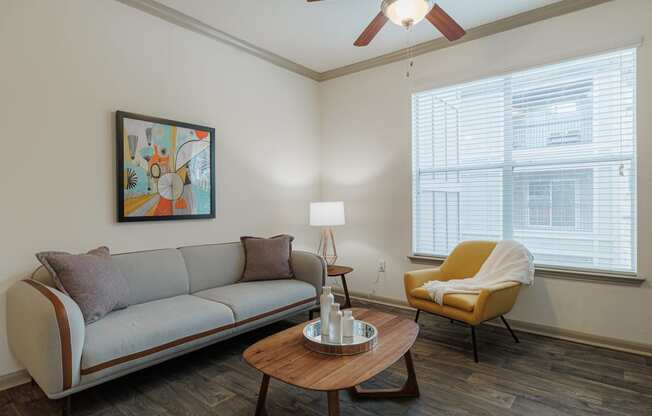 a living room with a couch and a coffee table