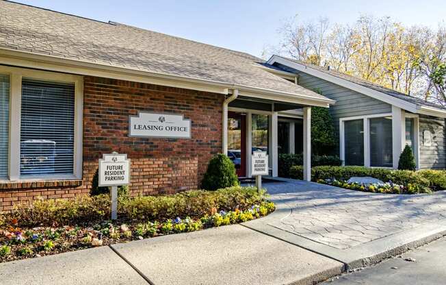 a brick building with a sign on the front of it