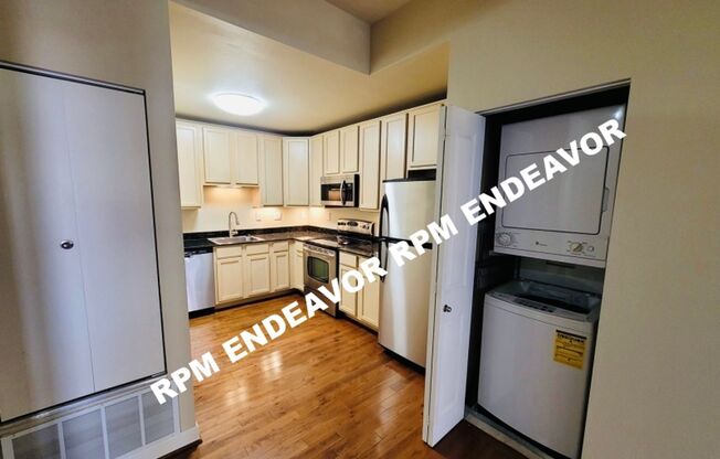 "Charming 2-Bed Condo with Bay Window & Gated Parking Near Wash U!