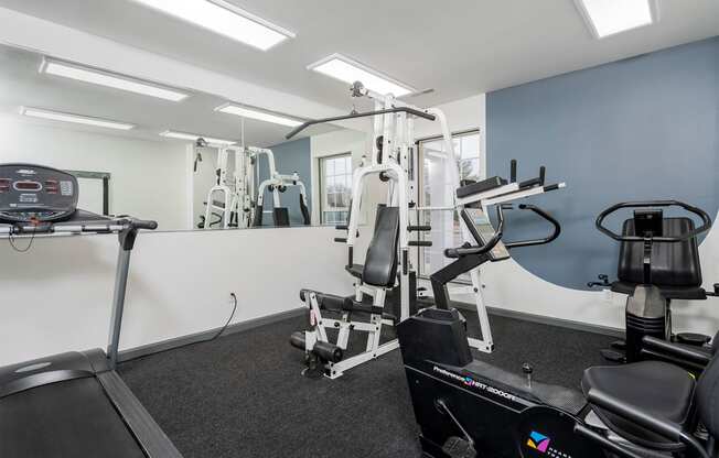 fitness center with weight and cardio equipment