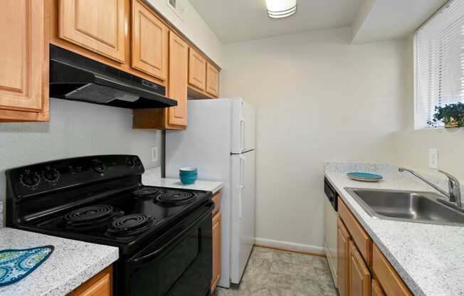 Fully Furnished Kitchen With Stainless Steel Appliances at The Fields of Old Town, Alexandria, Virginia