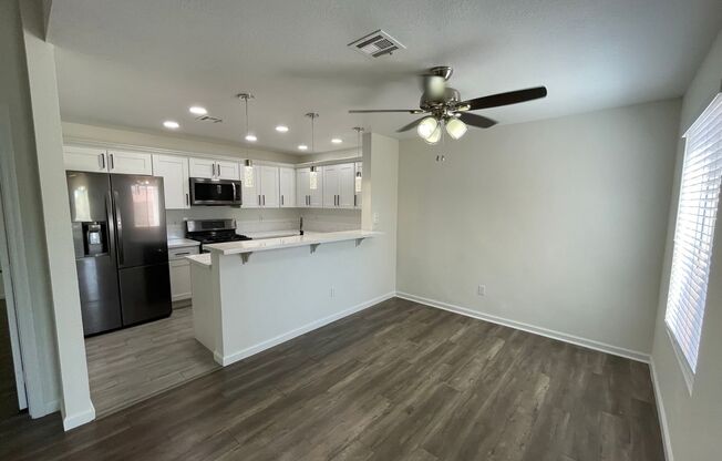 Welcome home to this recently remodeled 3 bedroom 2 bath condo with 2 car garage in a well maintained gated community.