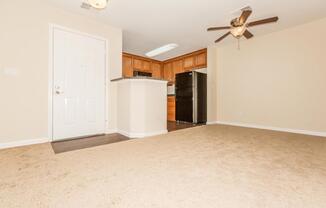 a large white refrigerator in a kitchen