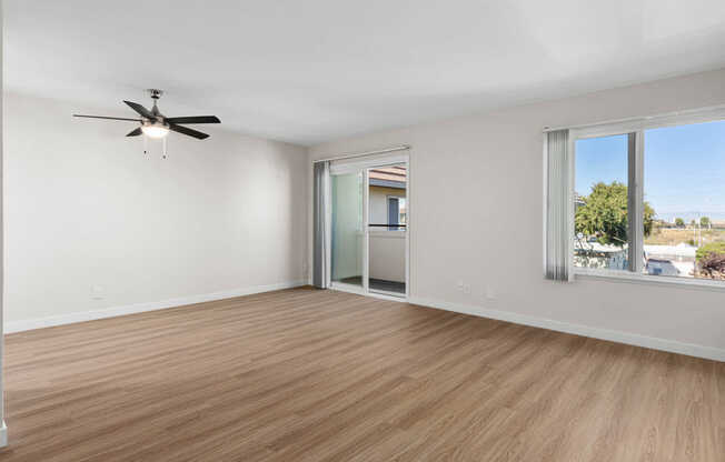 Living Room with Balcony and Hard Surface Flooring