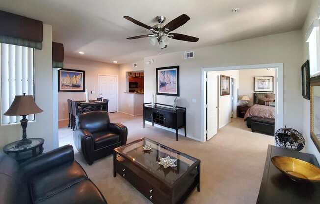 Living Room With Ceiling Fan at The Paramount by Picerne, Nevada