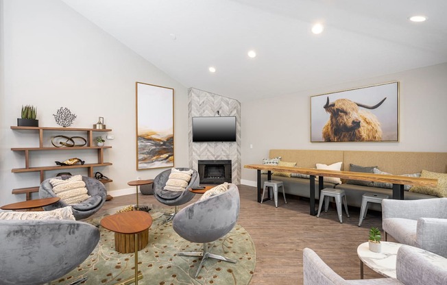 a living room filled with furniture and a fire place