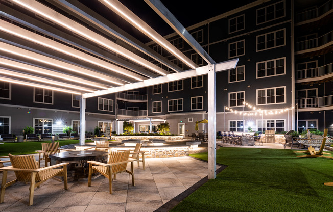 Courtyard at night at The Q | Apartments In Quincy