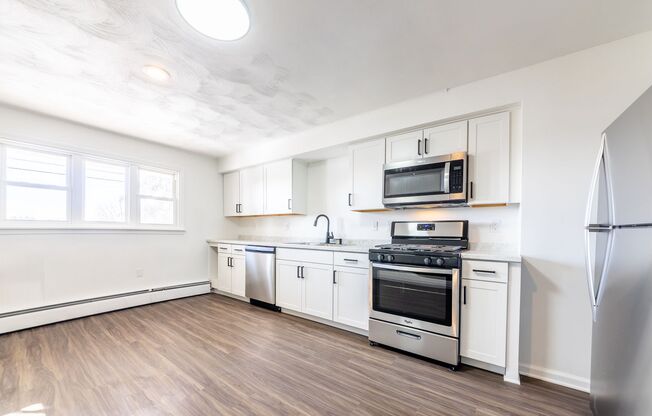 Available APRIL - Beautiful Renovated w/ Lots of Natural Light and Backyard Space!