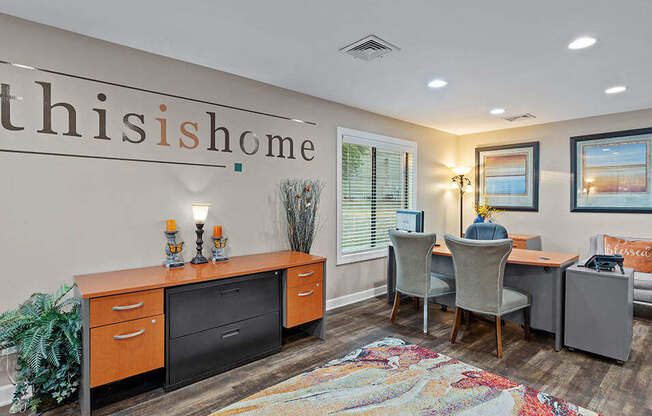 a conference room with a desk and a chair