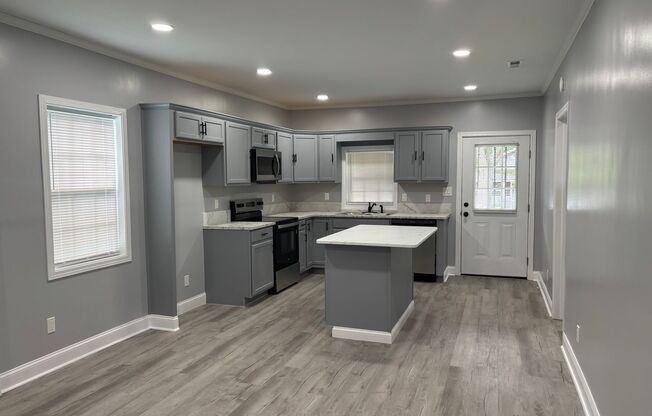 Fully renovated 3 bedroom 2 bathroom house!   Lawn Care Included