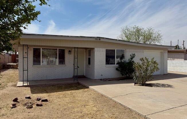Charming 4 Bedroom and 2 Bath with and Enclosed Yard!