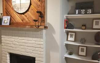 Oakwood Creek Apartments fireplace and shelving