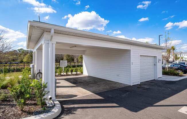 A white garage door is open.