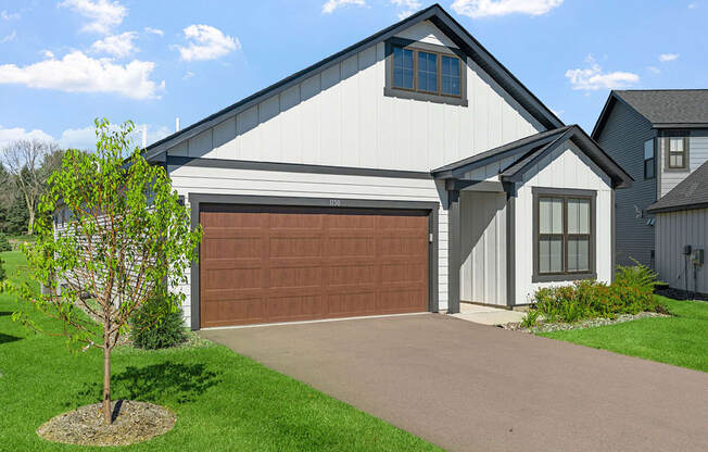 a garage door in front of a house