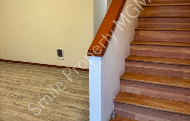 A nice house with 3 beds rooms and 1.5 baths.