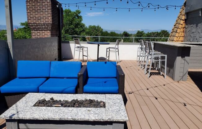 Beautifully upgraded rooftop patio with cornhole and grills