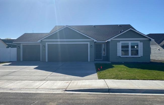 Occupied, do not go to the door. Newly built West Valley 3 br 2 ba 3 car garage, mowing included!