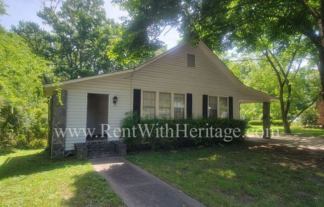 ENJOY THE PRESTIGE OF THIS CHARMING HOME IN DOWNTOWN HISTORIC DISTRICT / 2 BEDROOMS PLUS AN OFFICE