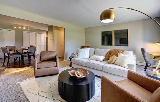 a living room with a couch and a table