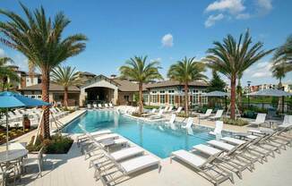 Resort style pool and lounge chairs