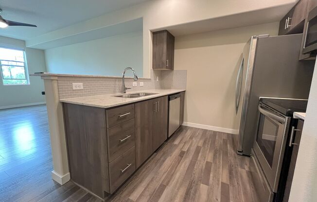 Modern 1-Bedroom Apartment with Stylish Finishes & Private Patio