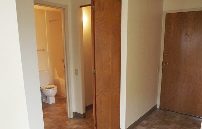 one  bedroom bathroom entry view
