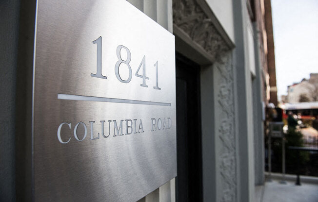 a building with a sign that reads 1841 columbia road