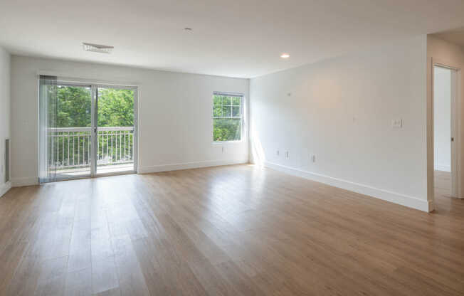 Living Room with Balcony and Hard Surface Flooring