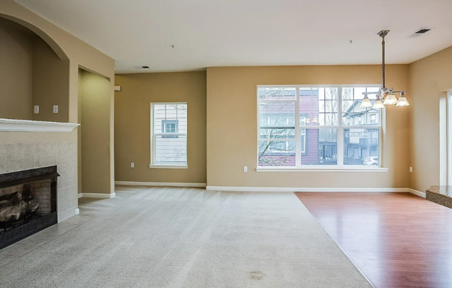 Charming 2-Bed Townhome in Sherwood with Pool Access, Garage, and Vaulted Ceilings!