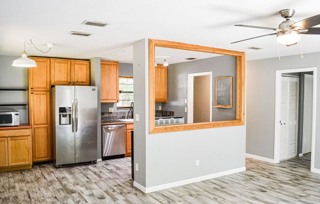 Check out this huge private fenced back yard at this Timberlane home!