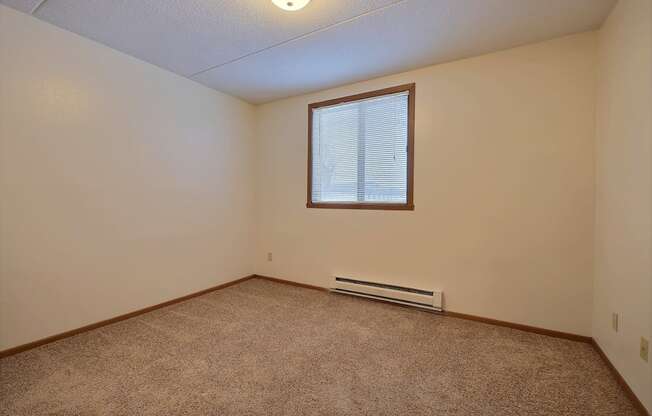 a bedroom with a window at France, North Dakota, 58103