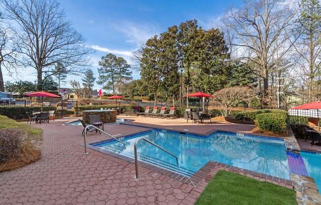 Community pool and custom paver sundeck