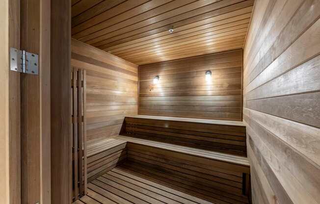 A wooden sauna with benches at Palma, Doral