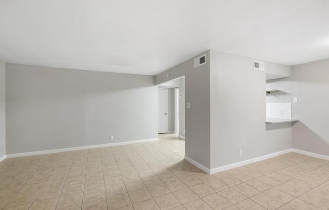 a kitchen with a tile floor