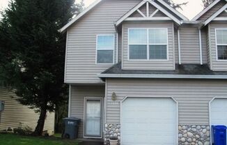 7400 NE Shaleen Street ~ Terrific Townhome with NEW Carpet & Paint!