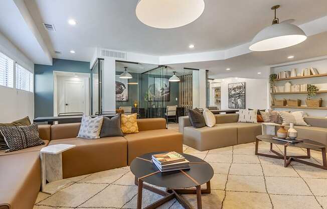 a living room with couches and a coffee table