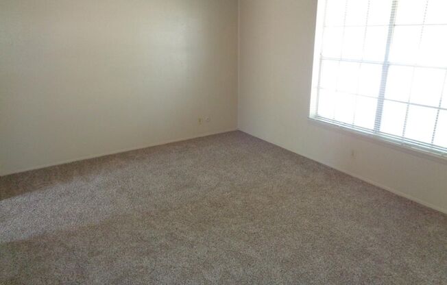 Cute Single Level Northeast Home With Evaporative Air Located In Quiet Neighborhood