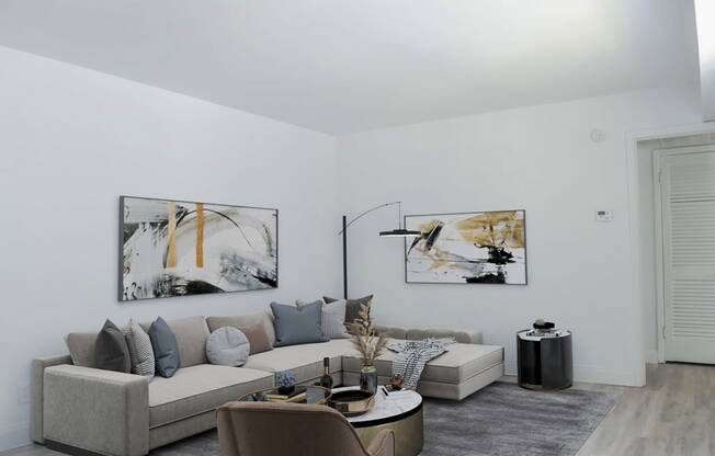 a living room with a couch and a table