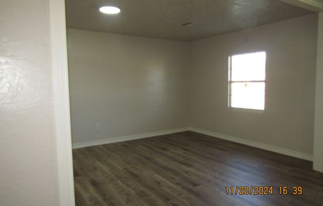 New listing-fresh paint and hard surface flooring. Housing assistance approved