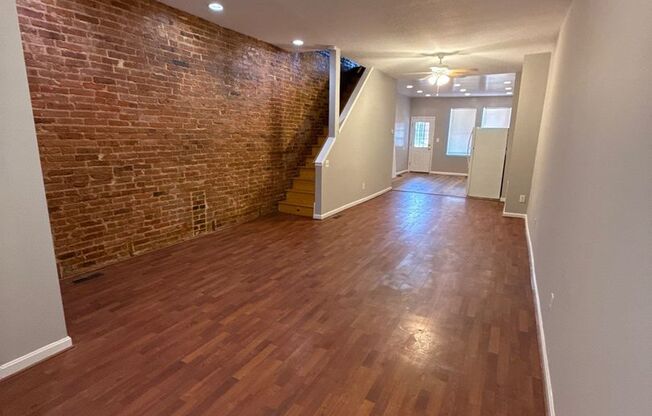 Charming Baltimore Rowhome with Private Deck & Exposed Brick